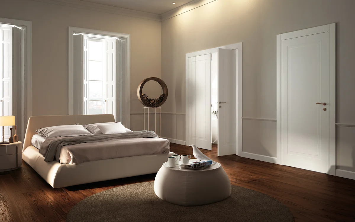Camera da letto con porte interne a battente e a libro