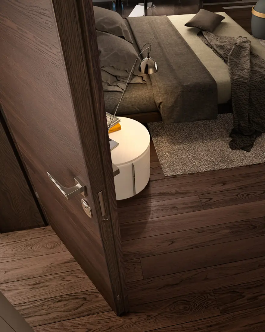 Dettaglio di una porta in legno per ingresso camera da letto