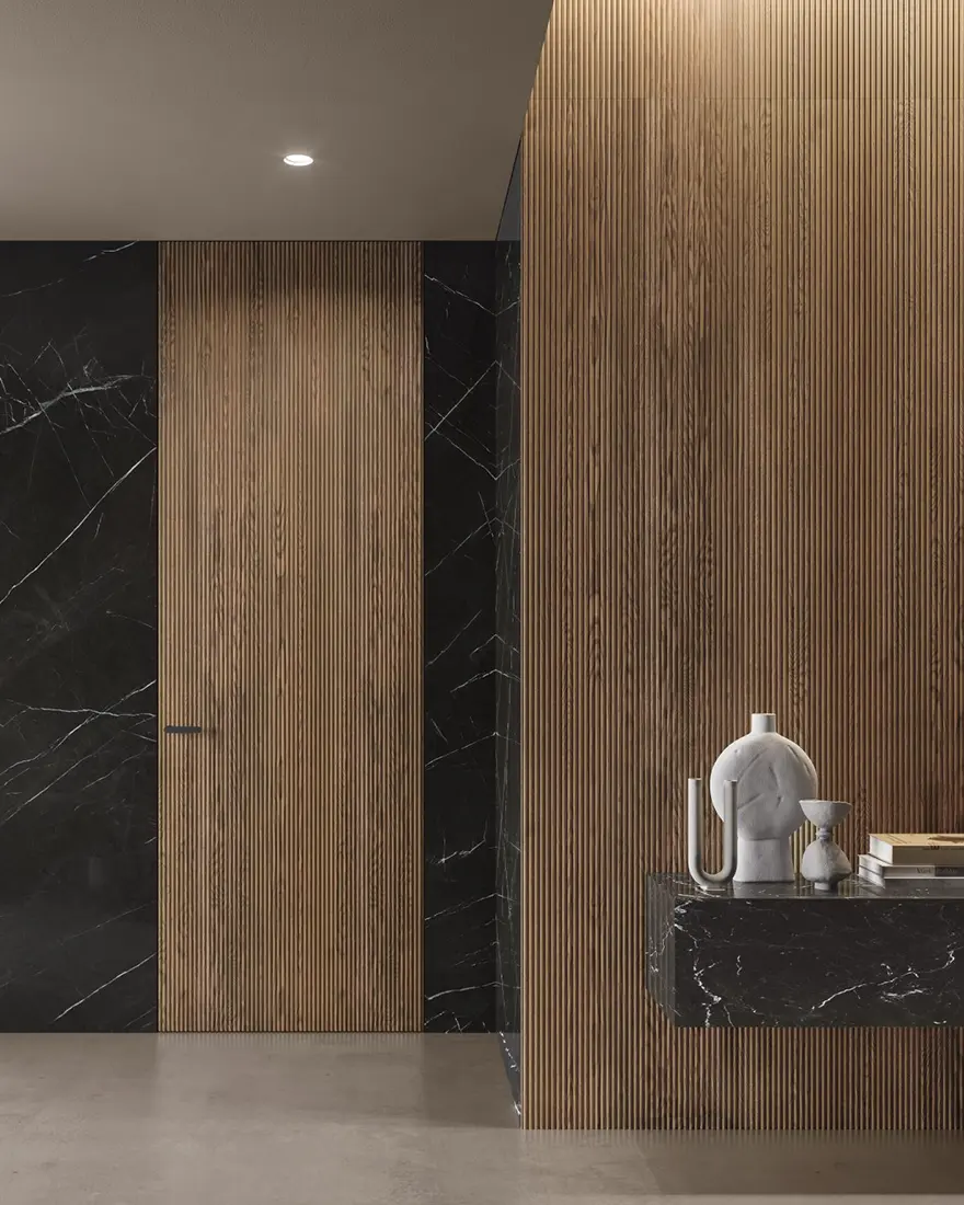 Porta filomuro in rovere su parte in marmo nero