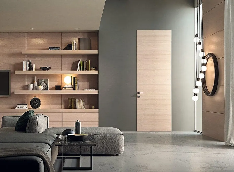 Porta-in-legno-filomuro-su-parete-grigia-in-Emilia-Romagna